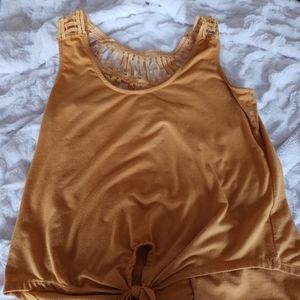 Poof yellow tank top, with tie in the front, and cut out design back size medium